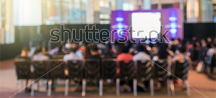 stock imge of audience at a presentation