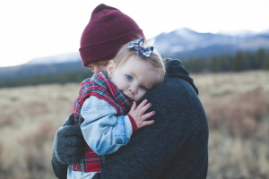 Man holding small child